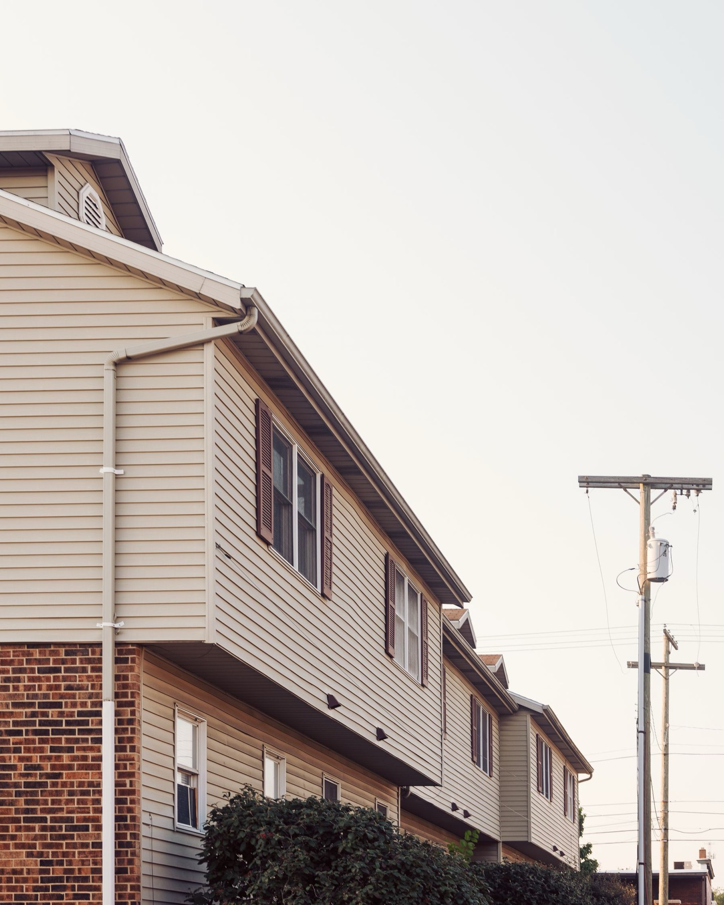 A row of ordinary two-storey townhouses.